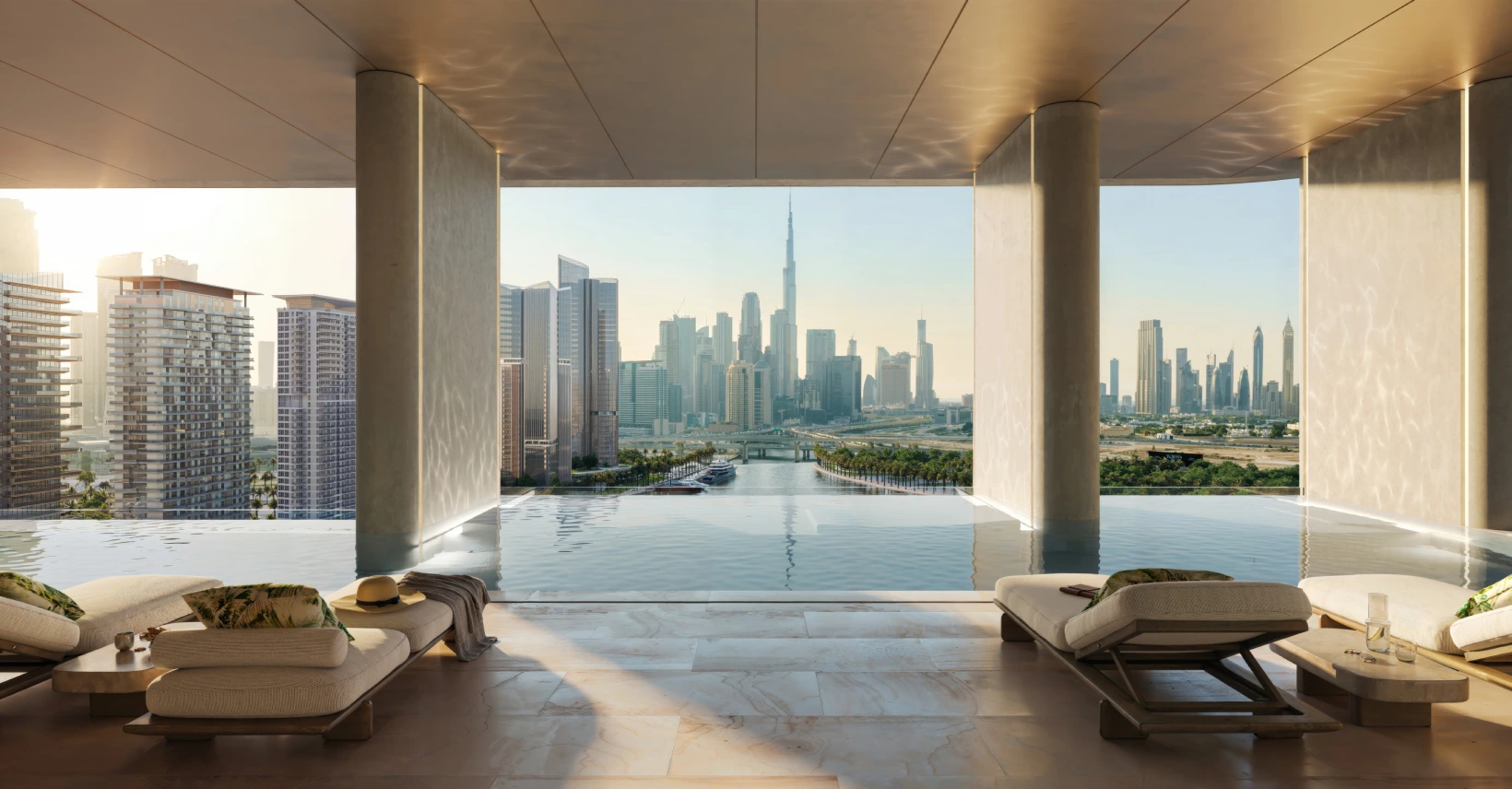 Leisure pool and sun deck at Artistry One Residences overlooking the Dubai Canal and Downtown Dubai skyline
